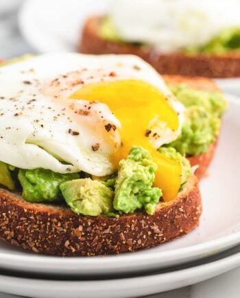 runny egg yolk on avocado toast