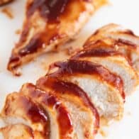baked bbq chicken slices close up