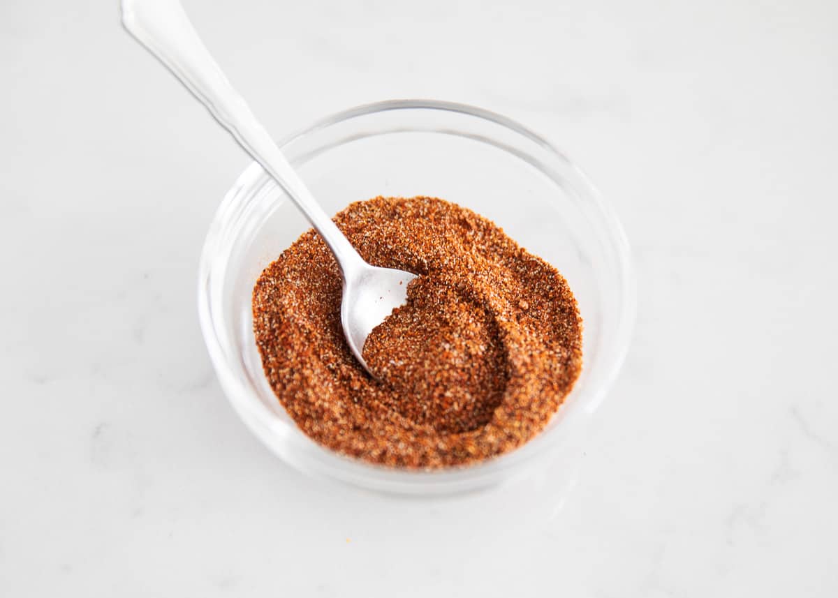 Fajita seasoning in clear bowl.