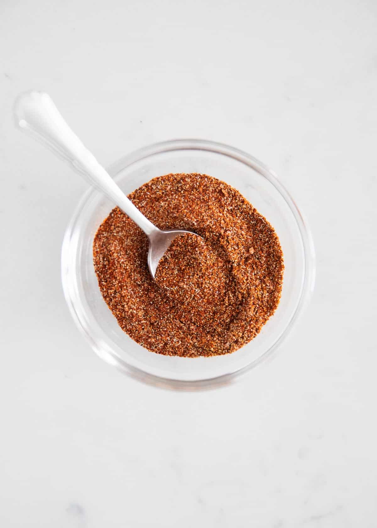 Fajita seasoning in clear bowl.