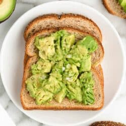 avocado toast on white plate