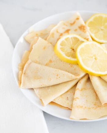 lemon crepes on white plate