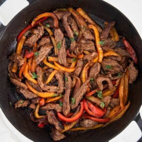 steak fajitas in pan