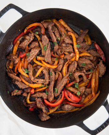 steak fajitas in pan