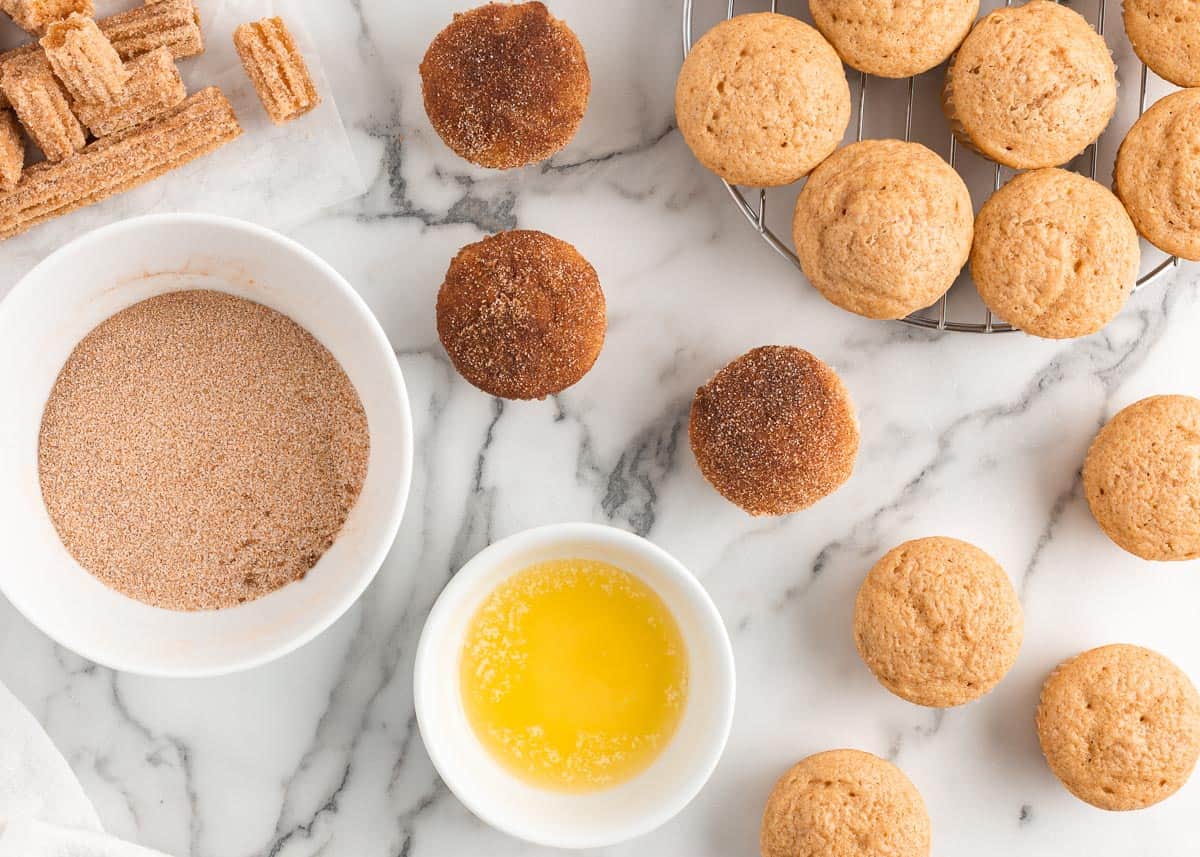 Churro cupcake ingredients on table.