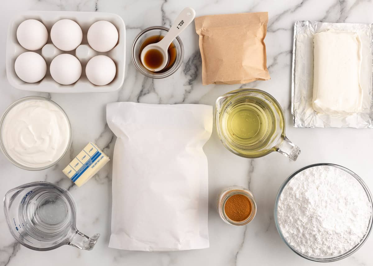 Churro cupcake ingredients on table.