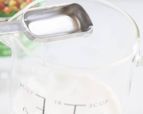 buttermilk in measuring cup