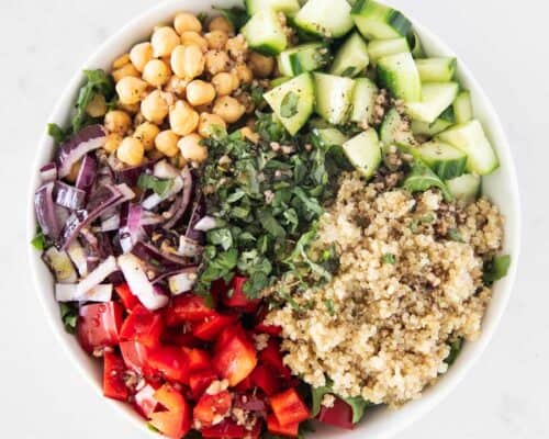 quinoa mediterranean salad ingredients in bowl