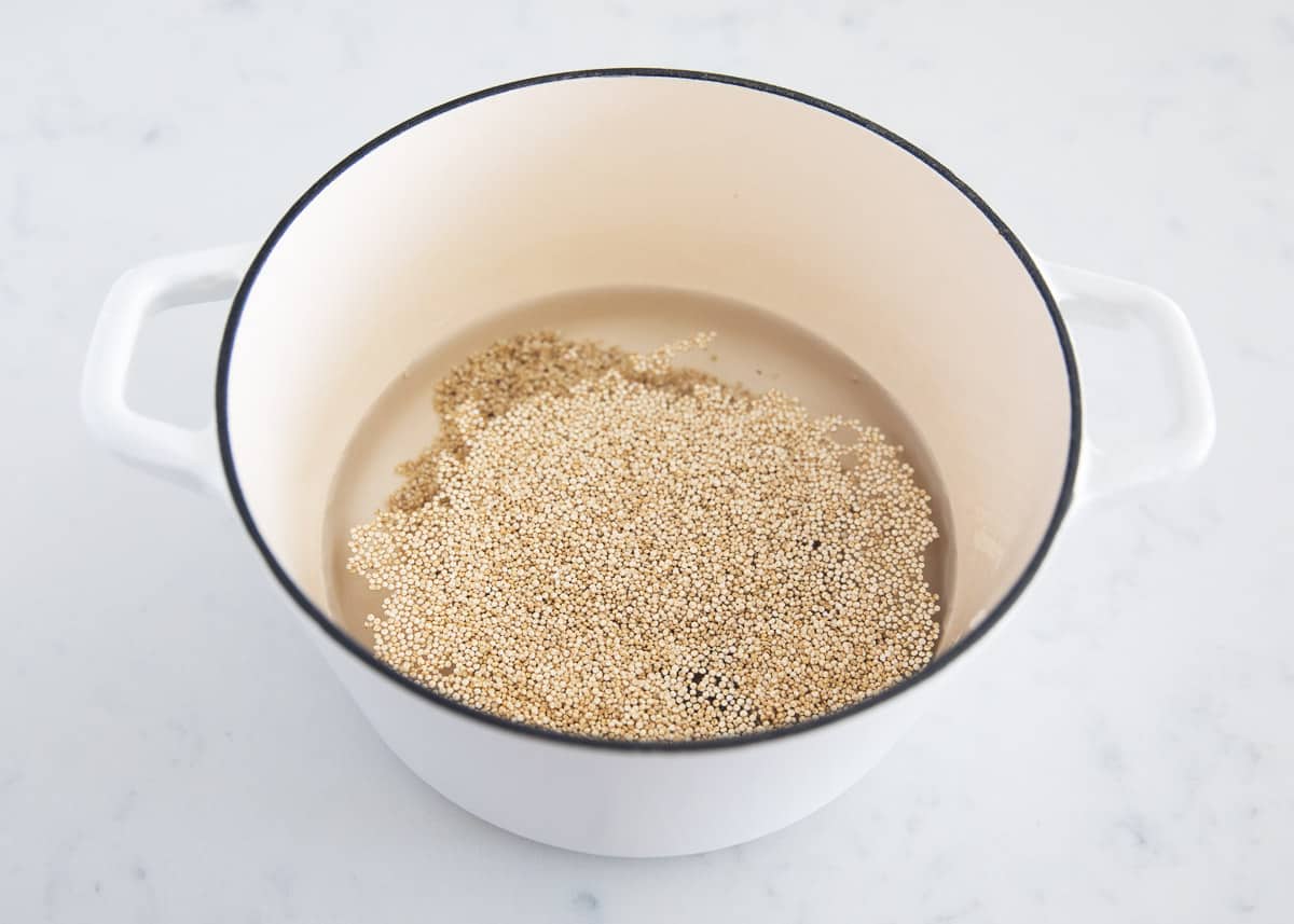 Quinoa and water in pot.