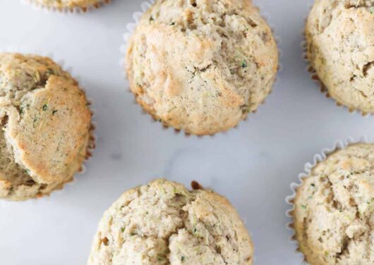 zucchini muffins on table