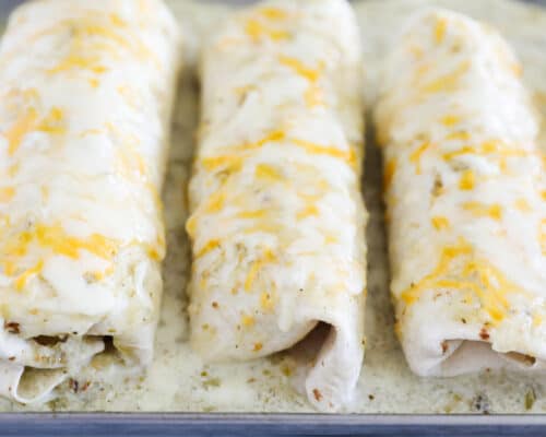 cooked chicken burritos on pan