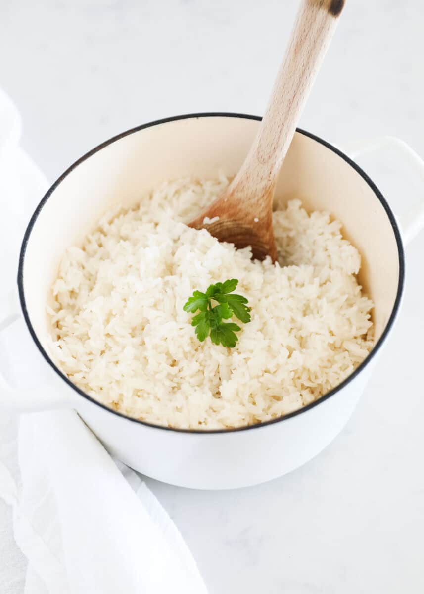 cooked coconut rice in white pot