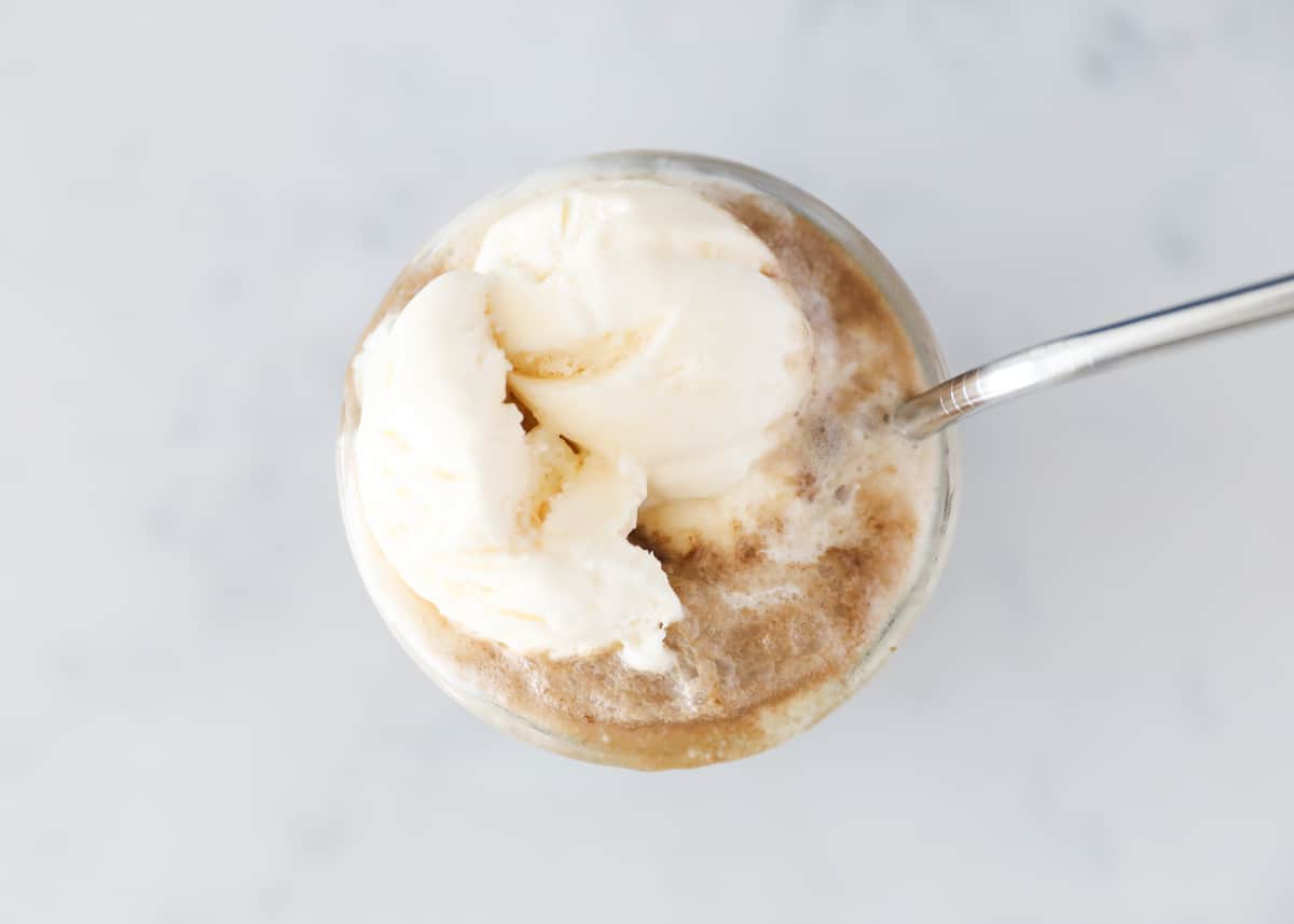 Over head shot of coke float with straw.