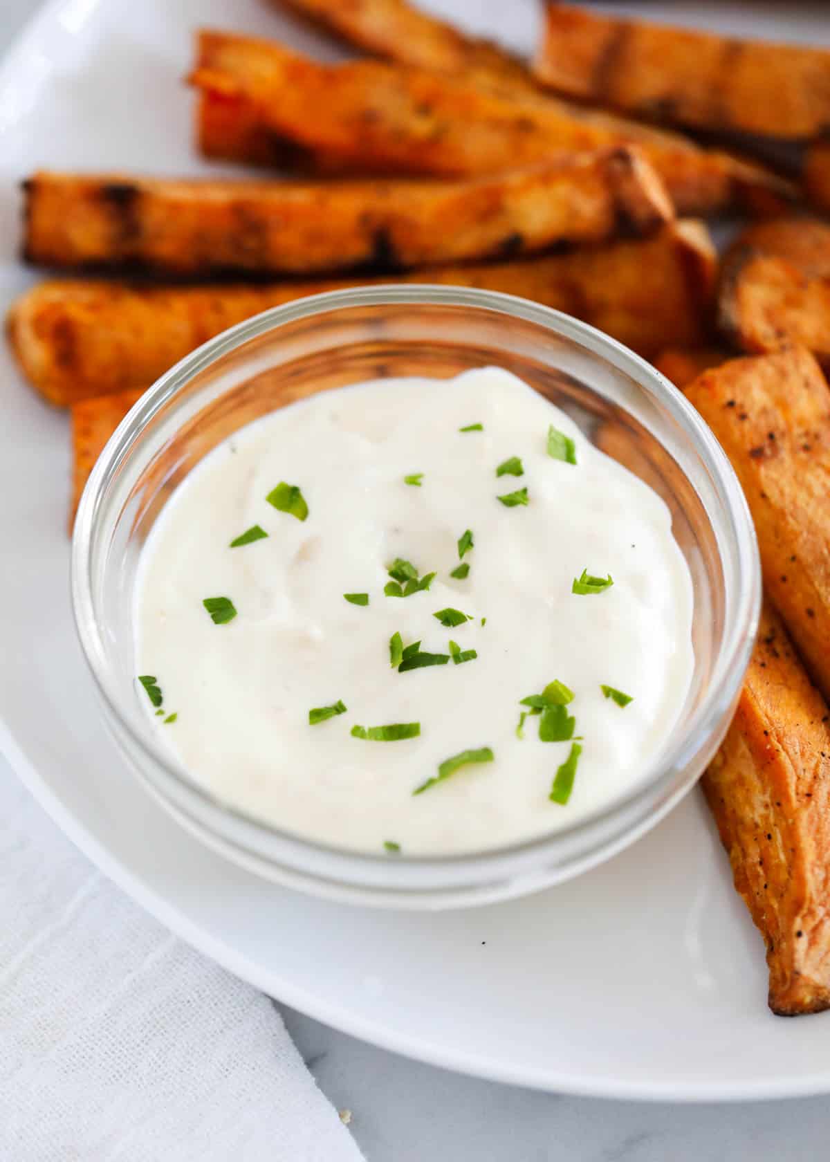 Close up of garlic aioli sauce in bowl.