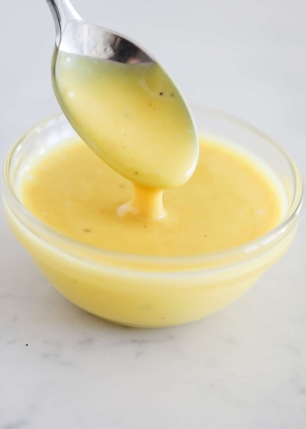 Honey mustard sauce in bowl.