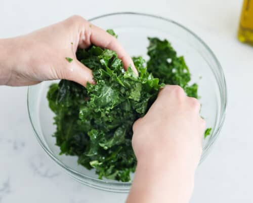 kale and oil in bowl