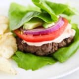 lettuce wrap burger on white plate