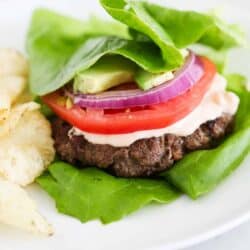 lettuce wrap burger on white plate