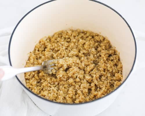 cooked quinoa in white pot
