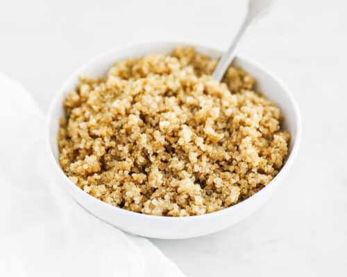cooked quinoa in white bowl