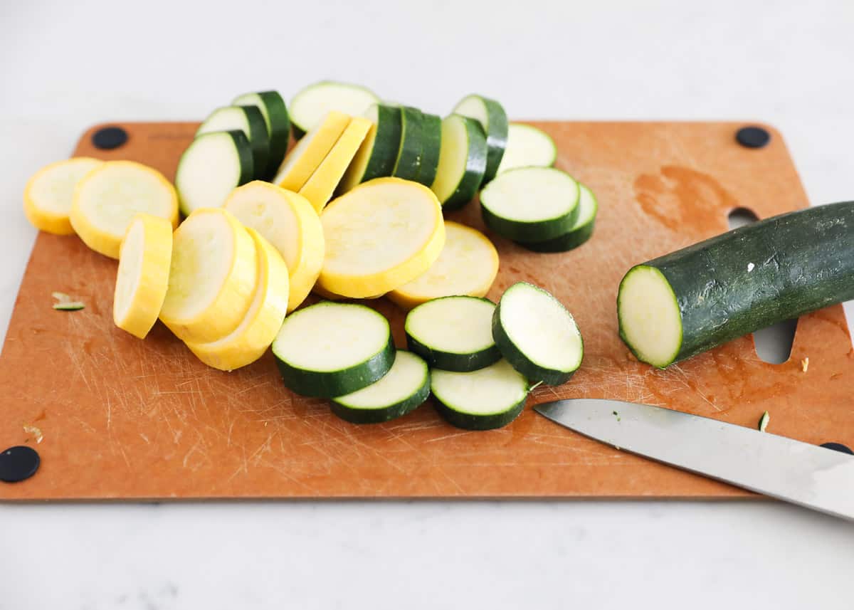 Zucchini and squash on cutting board.