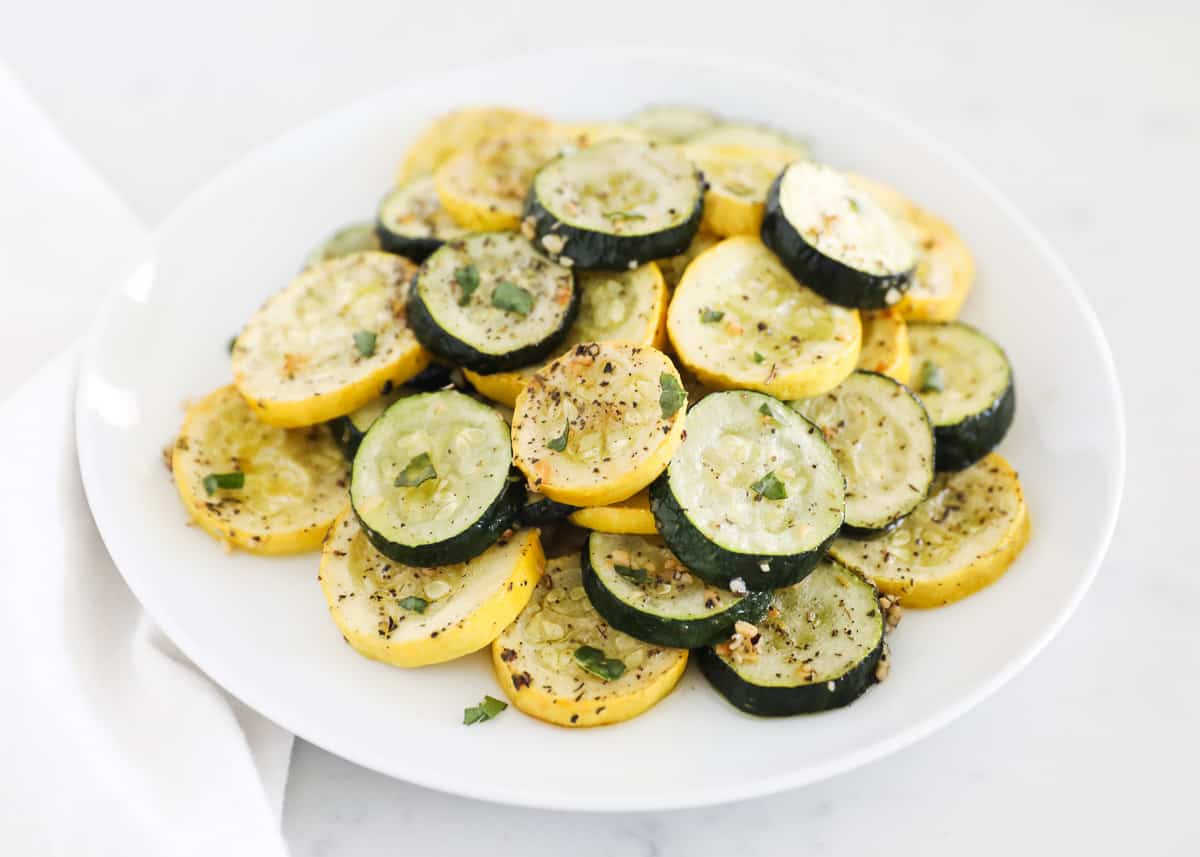 Roasted zucchini and squash on plate.