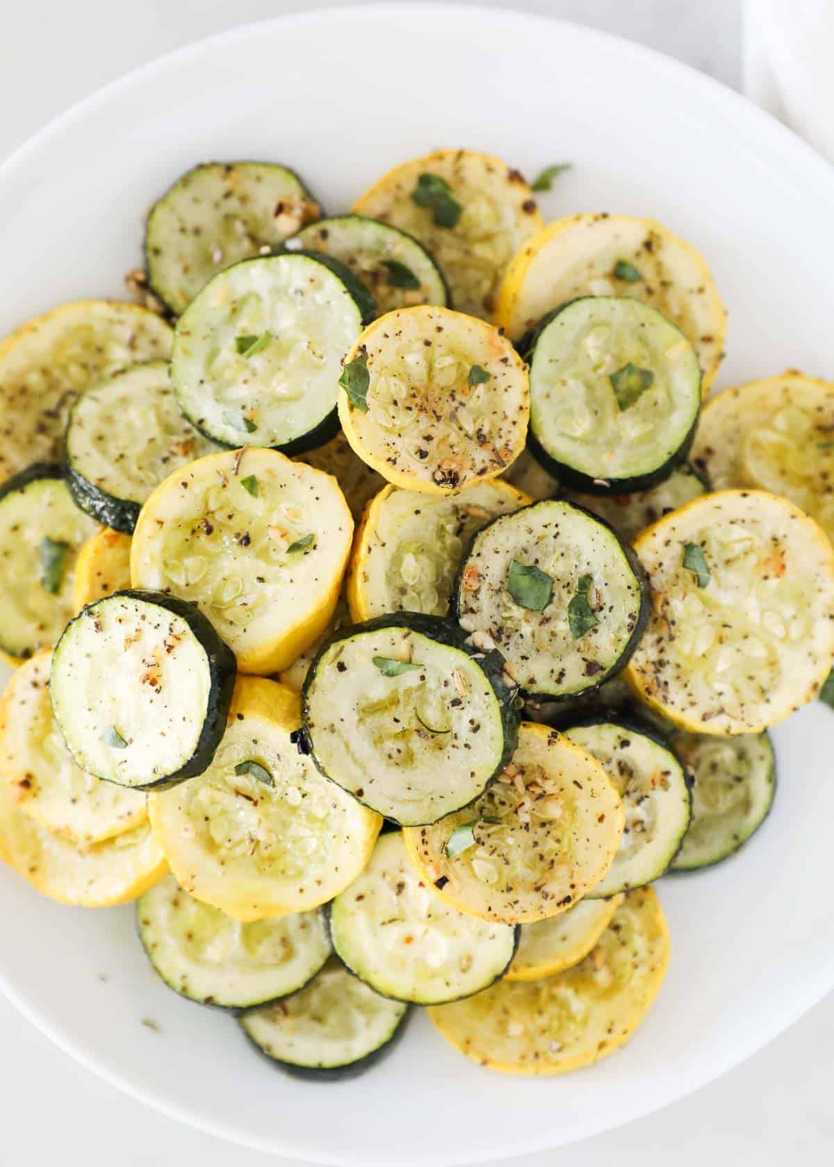 Roasted zucchini and squash on plate.