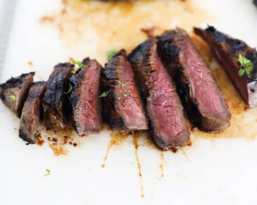 teriyaki steak slices on cutting board
