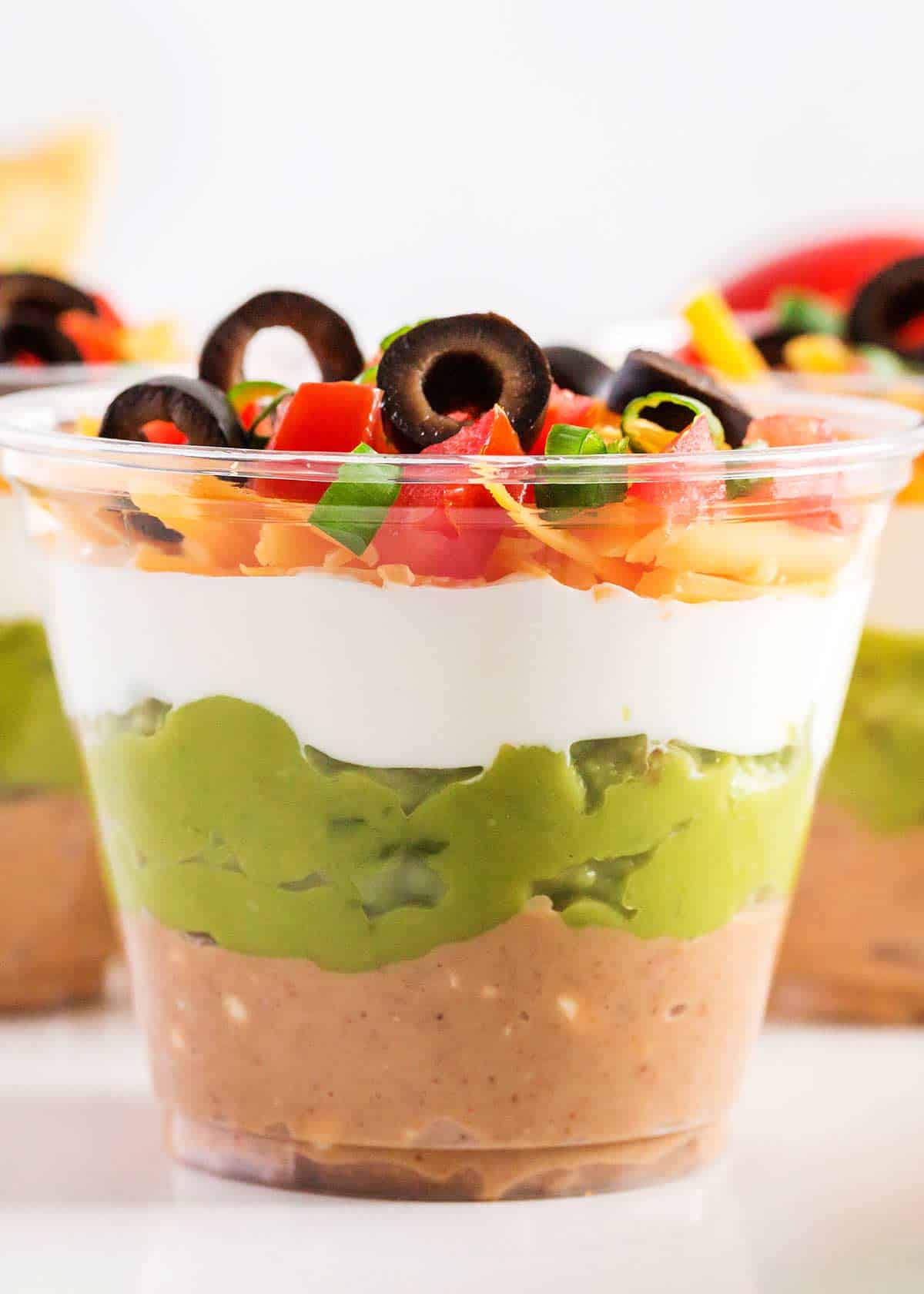 7 layer dip in plastic cups.