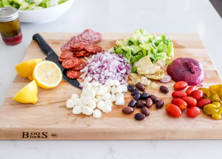 antipasto salad ingredients on cutting board
