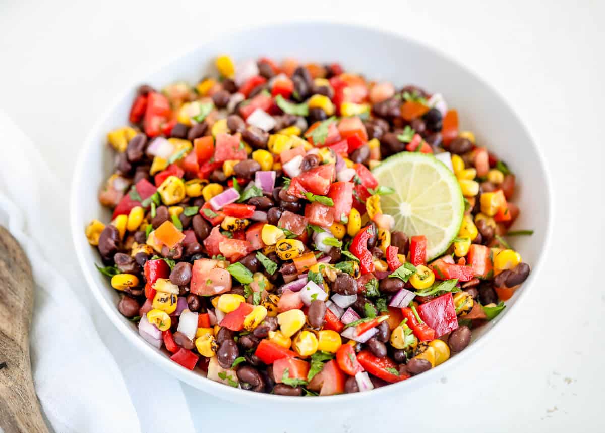 Black bean salsa in white bowl.