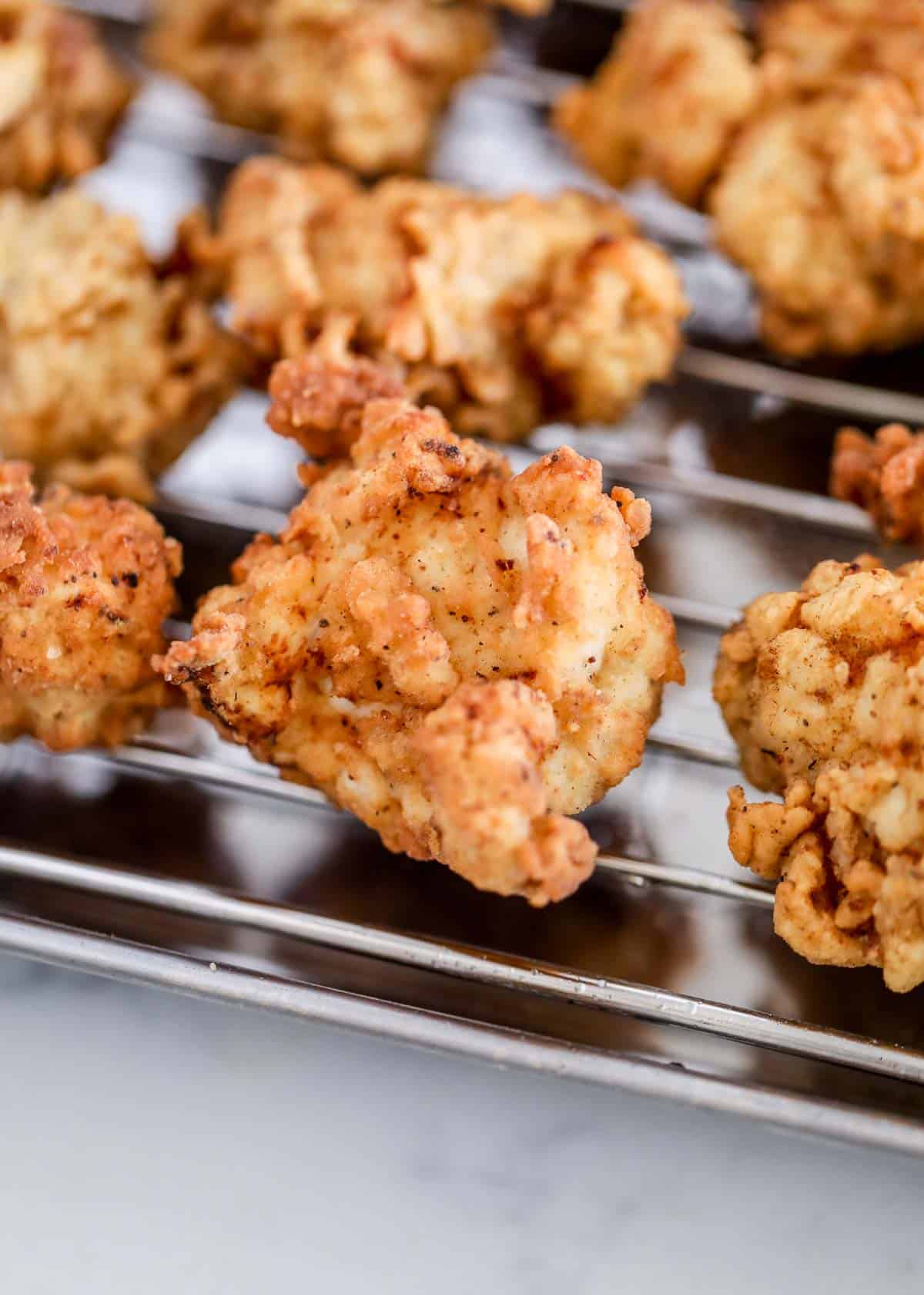 Chick fil a nuggets on cooling rack.