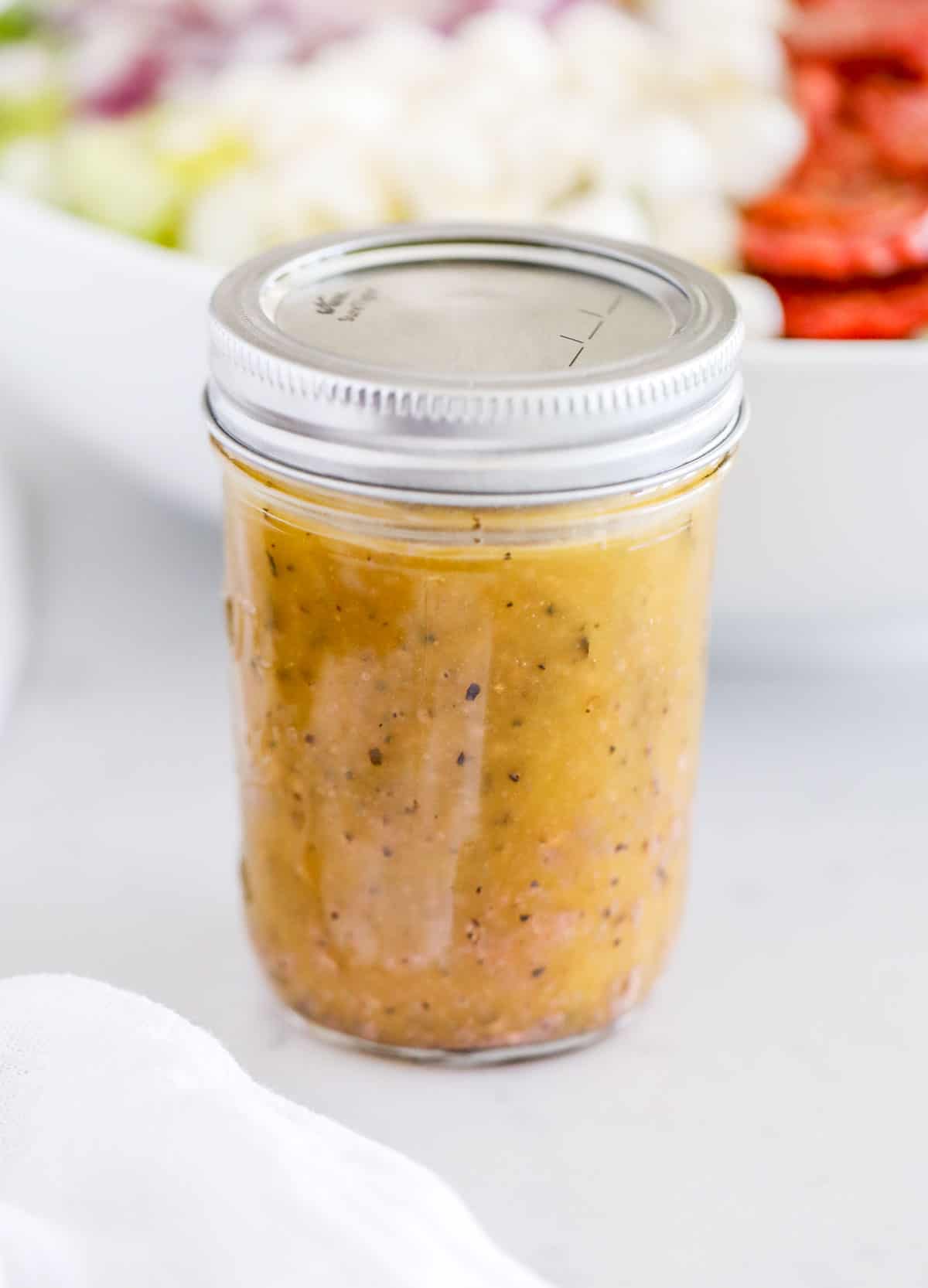 Jar of Italian dressing.