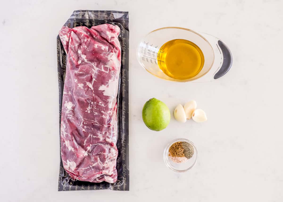 Skirt steak marinade ingredients on counter.