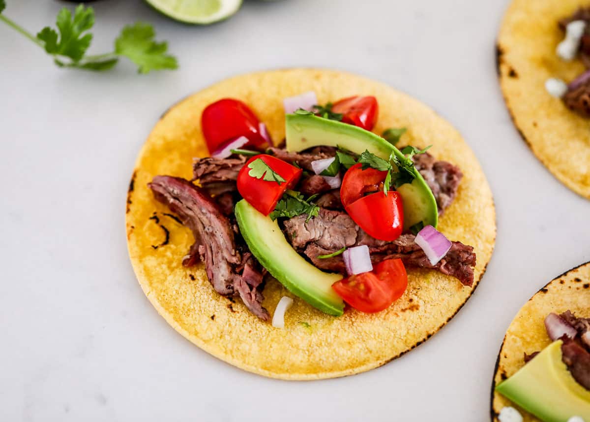 Skirt steak taco on counter.