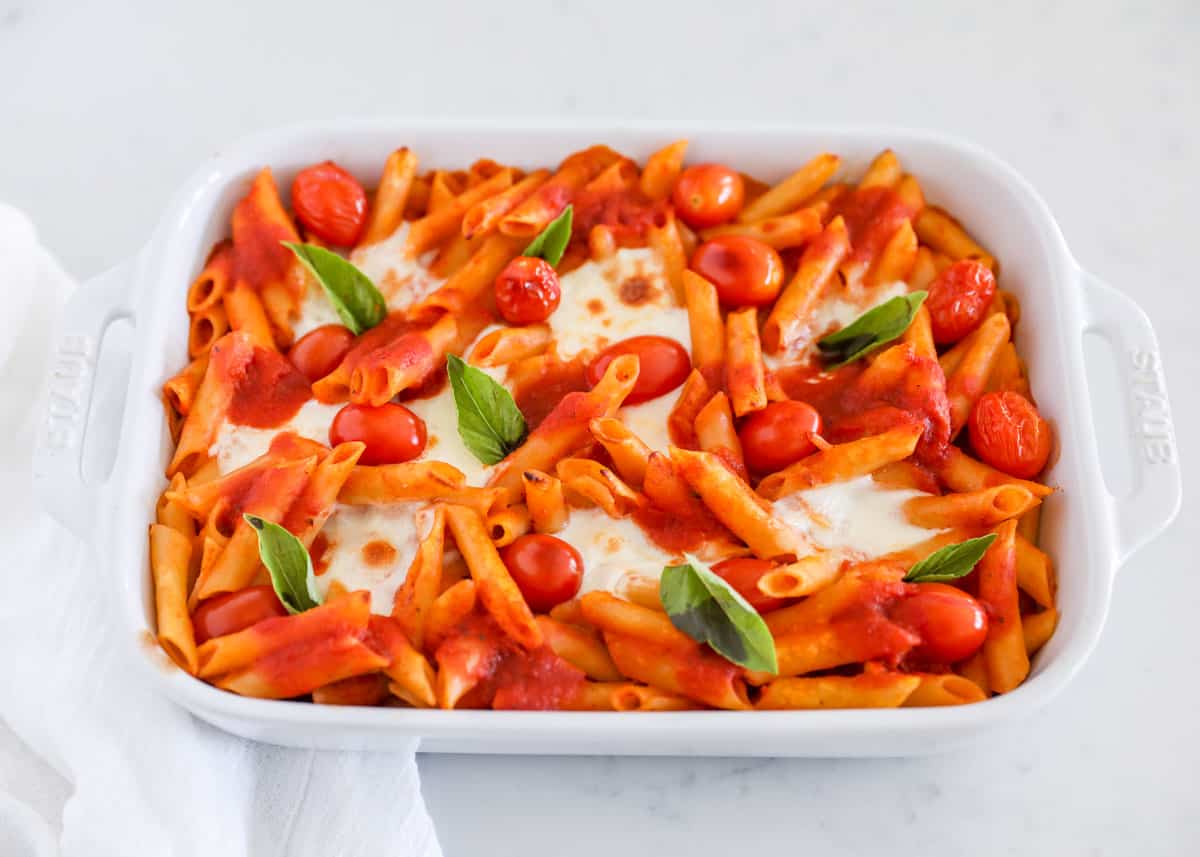 Caprese pasta bake dish on counter.