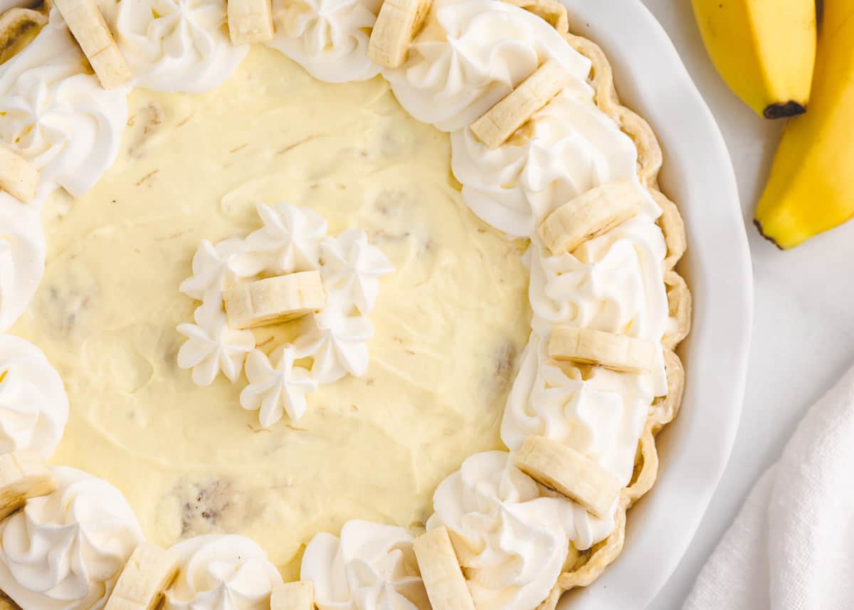 Banana cream pie on counter.