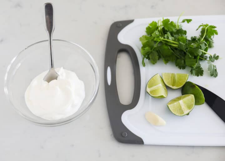 cilantro lime crema ingredients on table
