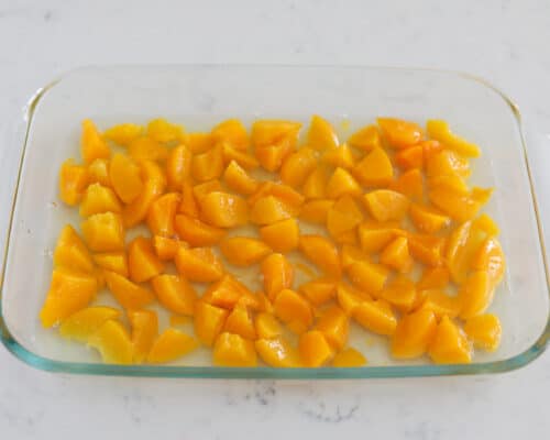 peaches in clear pan