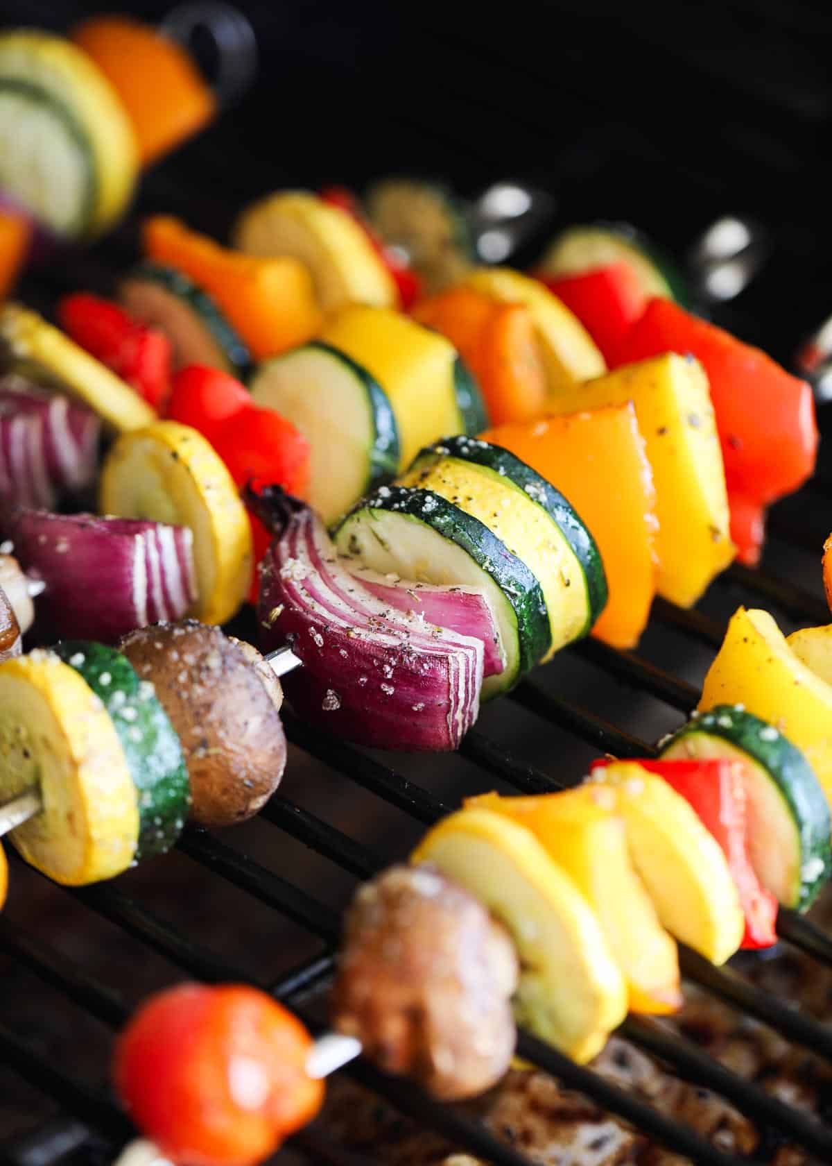 Vegetable skewers on grill.