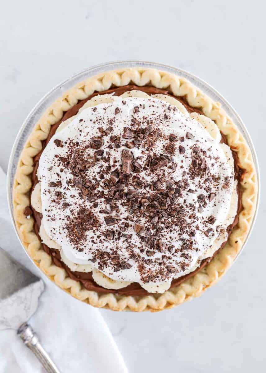 chocolate banana cream pie sitting on counter