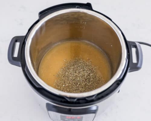 broth and seasoning in instant pot