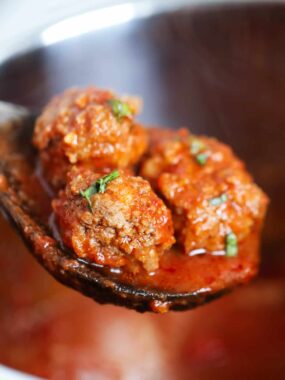 Spoonful of Instant meatballs and marinara.