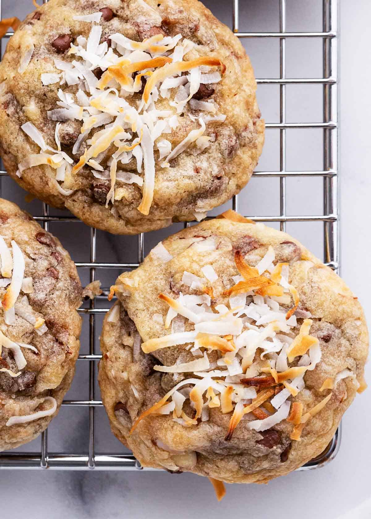 Almond joy cookies on cooling rack.