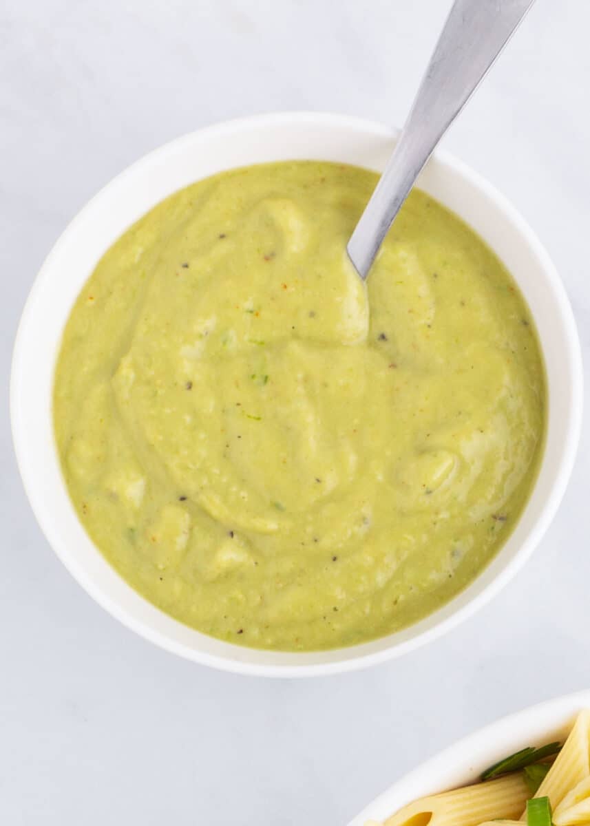 avocado lime dressing in white bowl