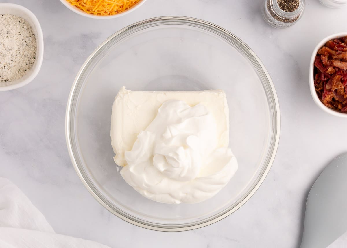 cream cheese and sour cream in bowl