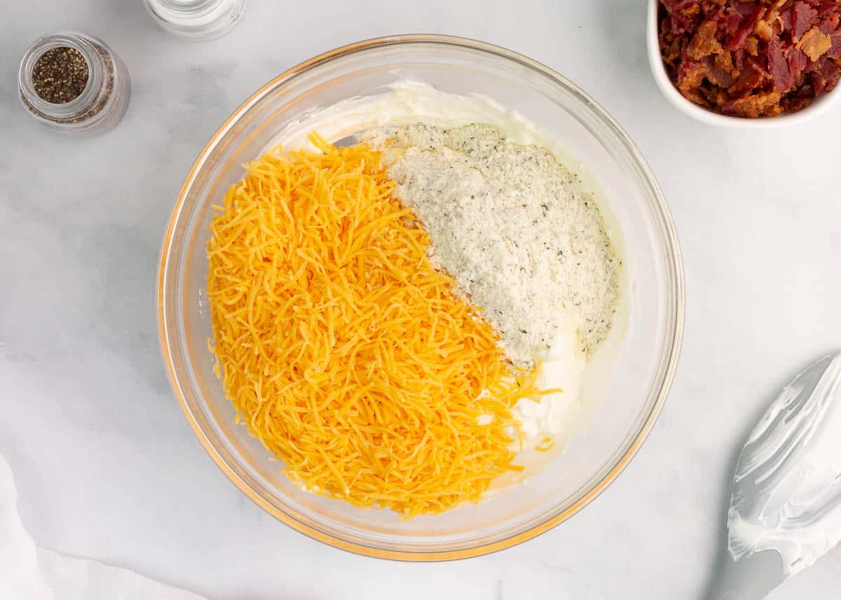 cheddar cheese and ranch seasoning in bowl