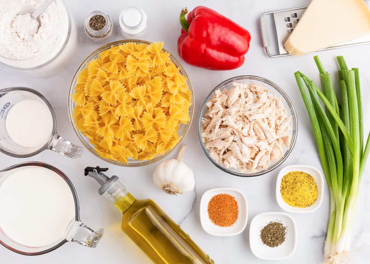 Chicken pasta ingredients on countertop.