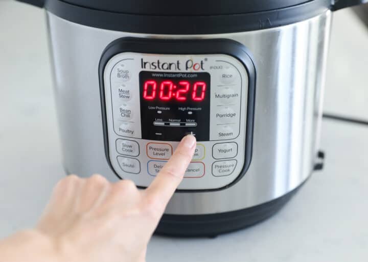 pressing finger on instant pot