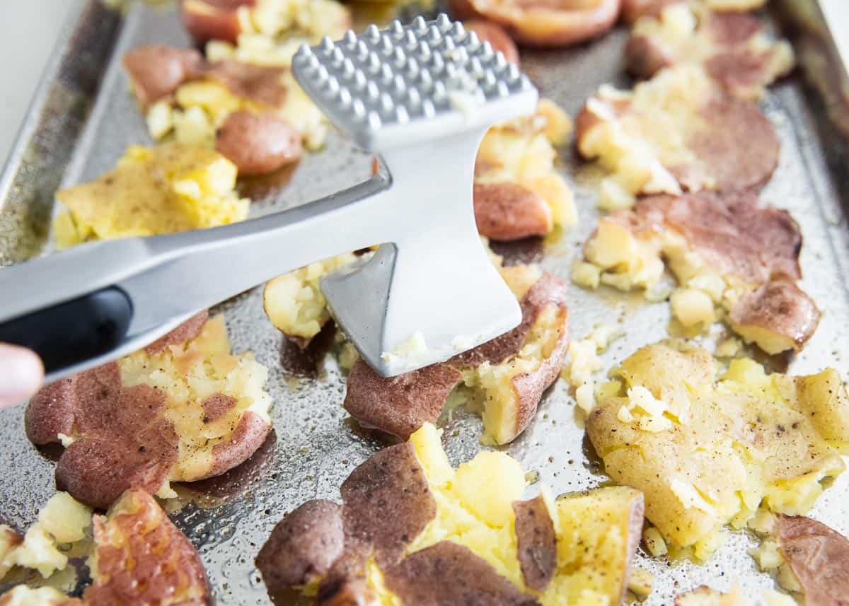 Smashed potatoes with a mallet.